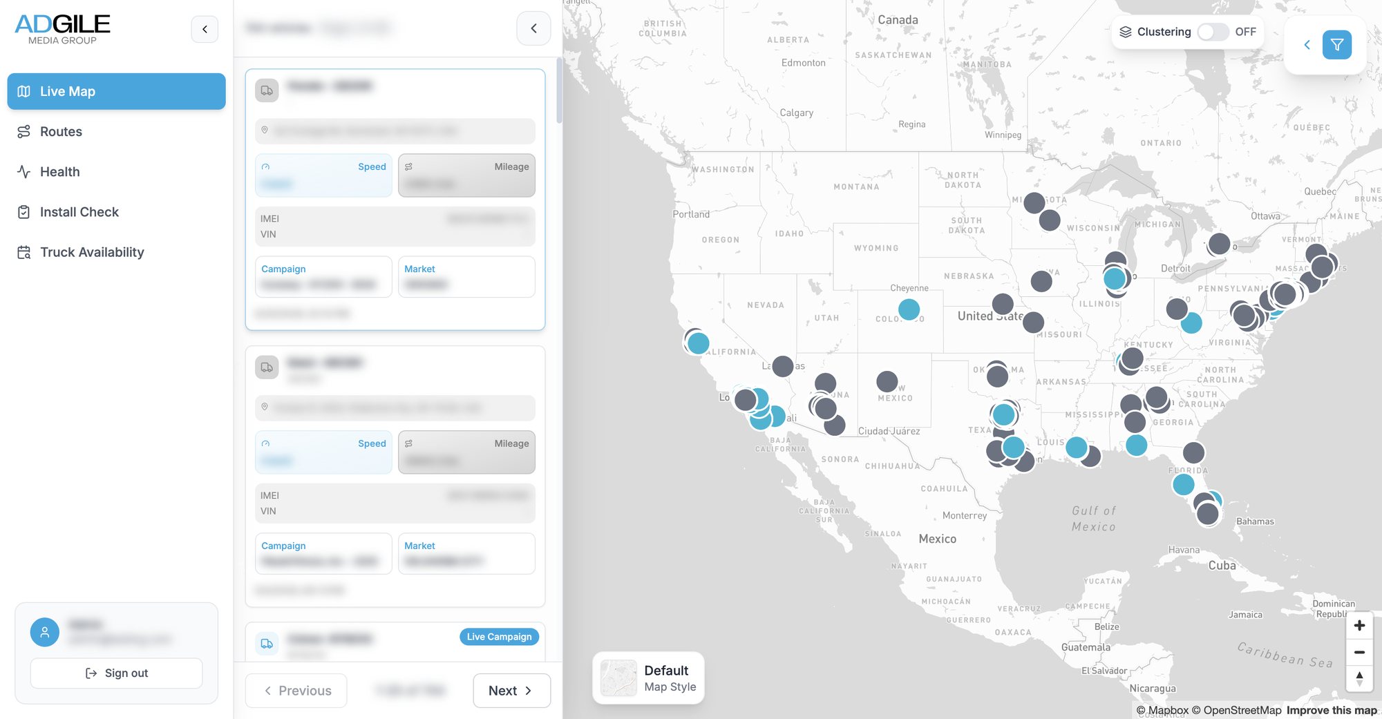 The live map: the app's sidebar, a list of truck cards with speed, mileage, campaign and market, and truck markers across the United States, grey when parked and blue on a live campaign