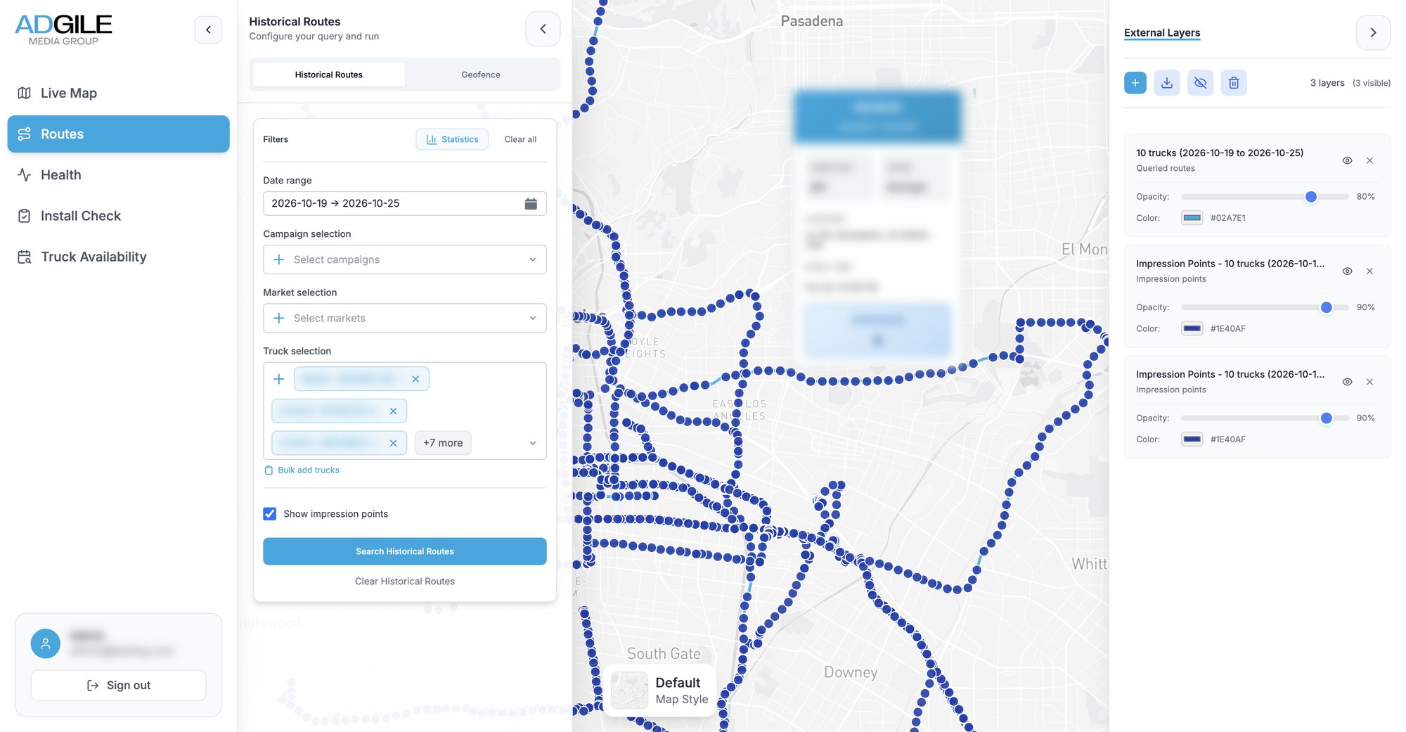 Routes view over east Los Angeles: a week of routes for ten trucks drawn as chains of dark blue impression points along the streets, with the query panel on the left and the layer list on the right