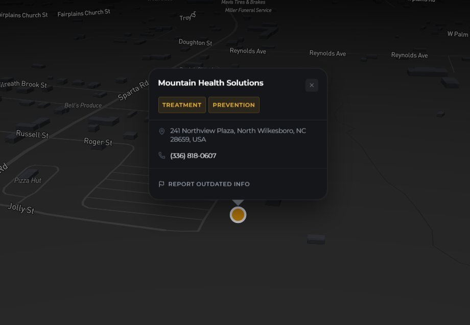 A resource card on the map showing name, resource-type badges, address, phone number and a Report Outdated Info link